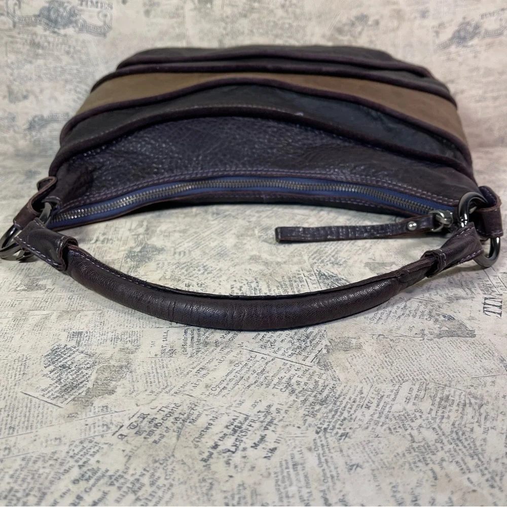 Innue leather purple and tan rustic hobo shoulder bag made in Italy